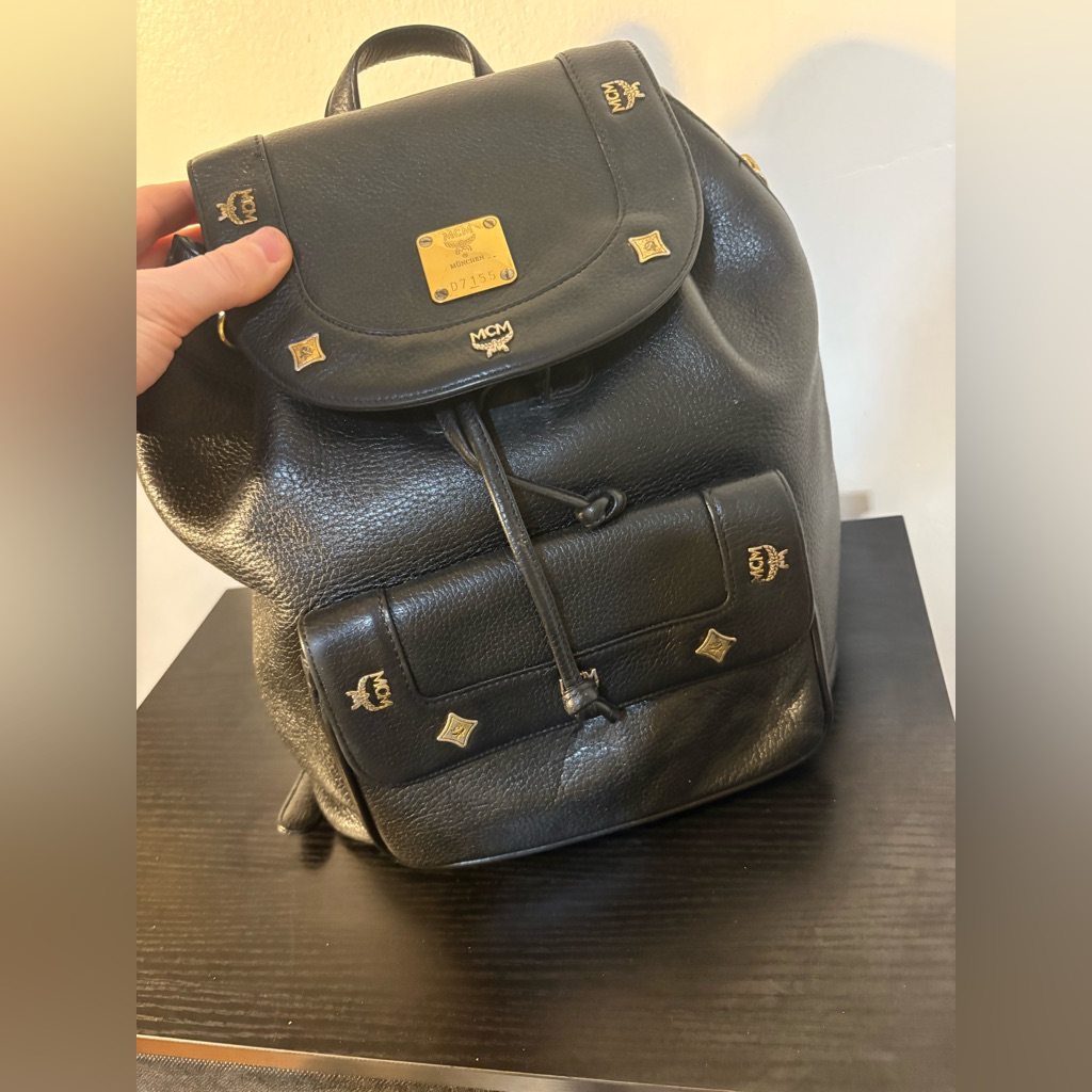 Mcm Black Leather Backpack With Gold Accents And Draw Strings 12"X11"